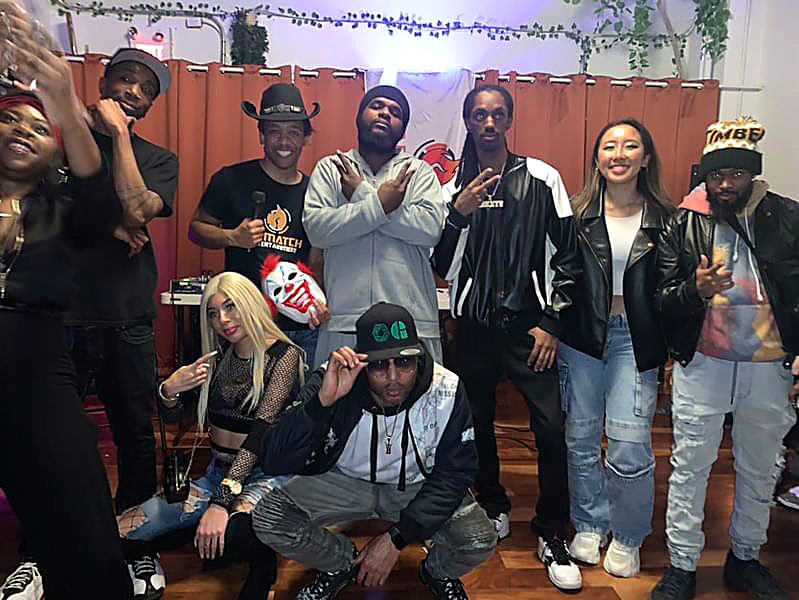 NoMatch and a group of collaborators posing together at a studio session